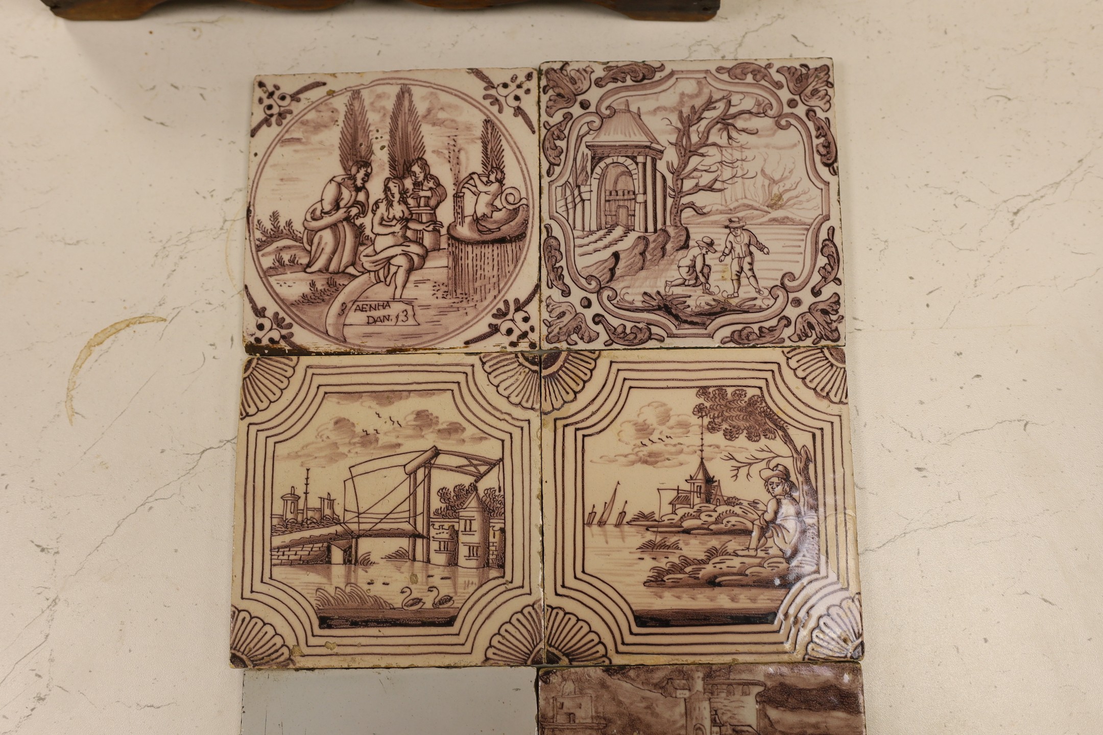 Six Delft manganese tiles, 18th century, each decorated with figures or animals in landscapes, five 12.5 cm